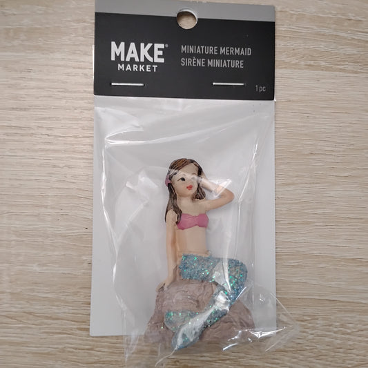Mermaid on a rock figurine